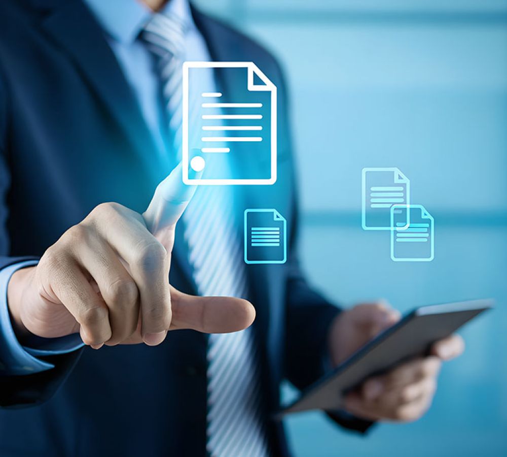 Businessman using tablet and touching digital document icons, technology concept.